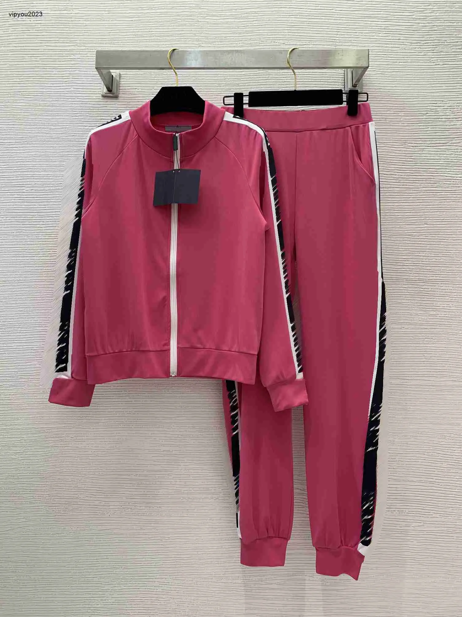 Luxury women two piece set designer clothing Front zipper long sleeve thin coat top with elastic waist tied sweatpants and trousers Jan 08