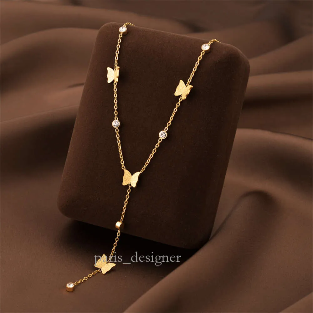 Style à la mode Su papillon clouté diamant titane acier collier femmes mode haut de gamme Design clavicule chaîne 954 473