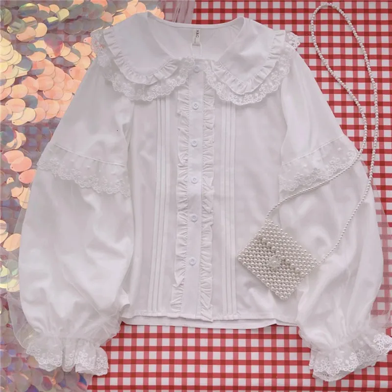 Chemise Lolita blanche élégante femmes Blouses de Style Preppy mignon col claudine dentelle à volants JK chemises filles à manches longues Blusas Mujer 240109