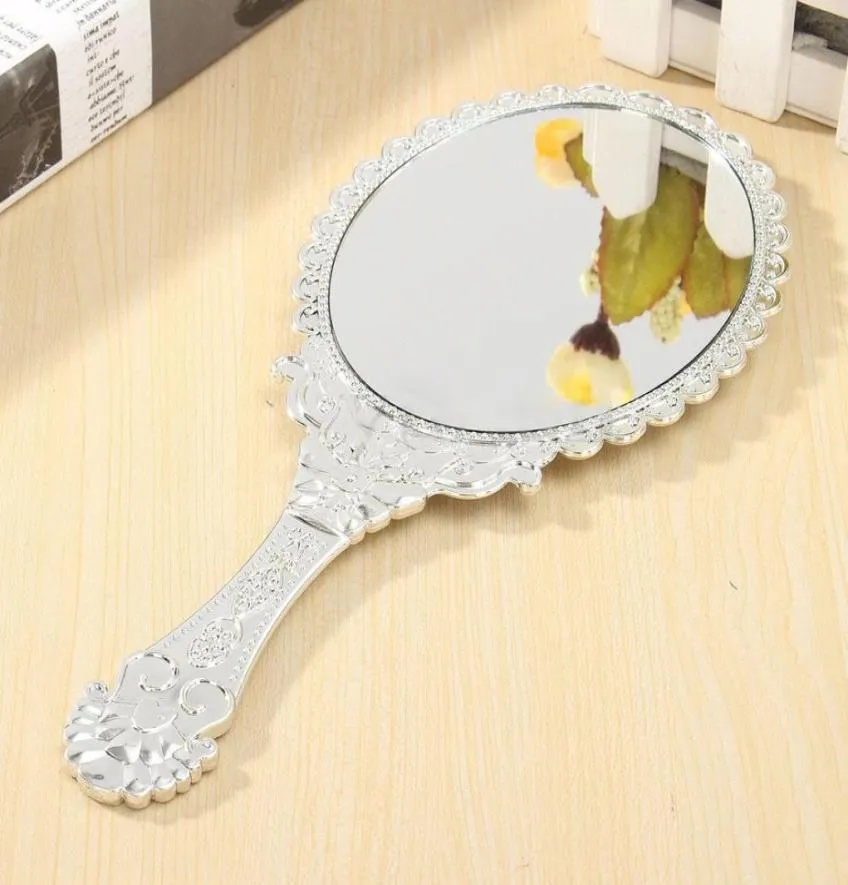 Dames Vintage Repousse Bloemen Hand Held Ovale Spiegel Make-up Dressoir4378804