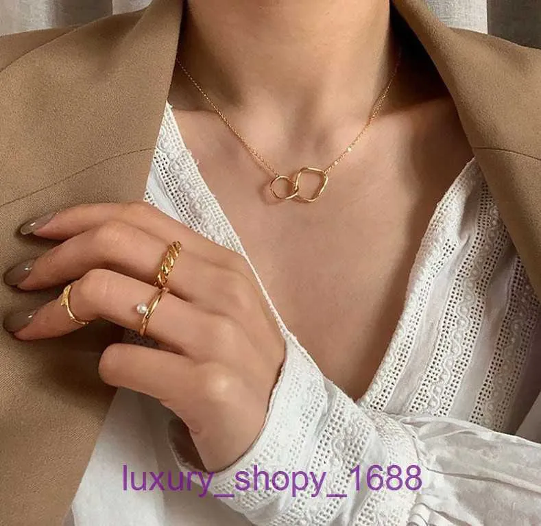 Wisiork naszyjnik opon opon obtorek projektant biżuterii chłodny wiatr prosty temperament podwójny pierścień