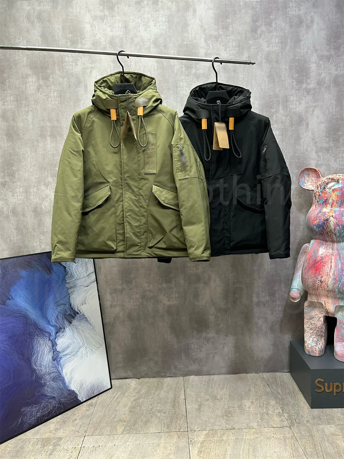 Veste en duvet pour hommes Manteaux d'hiver Manteau de styliste Parka à capuche épaisse Pata Alpinisme Coupe-vent Couple Outillage Doudoune Veste Hardshell chaude en plein air