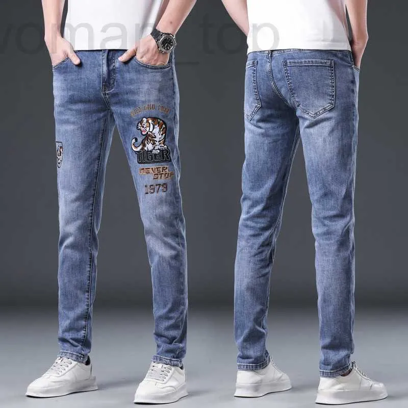 Jeans pour hommes Designer Automne Nouveau Slim Fit Élastique Lettre Broderie Brodée Perforée Petits Pieds Pantalon Marque De Mode Long RMQ5
