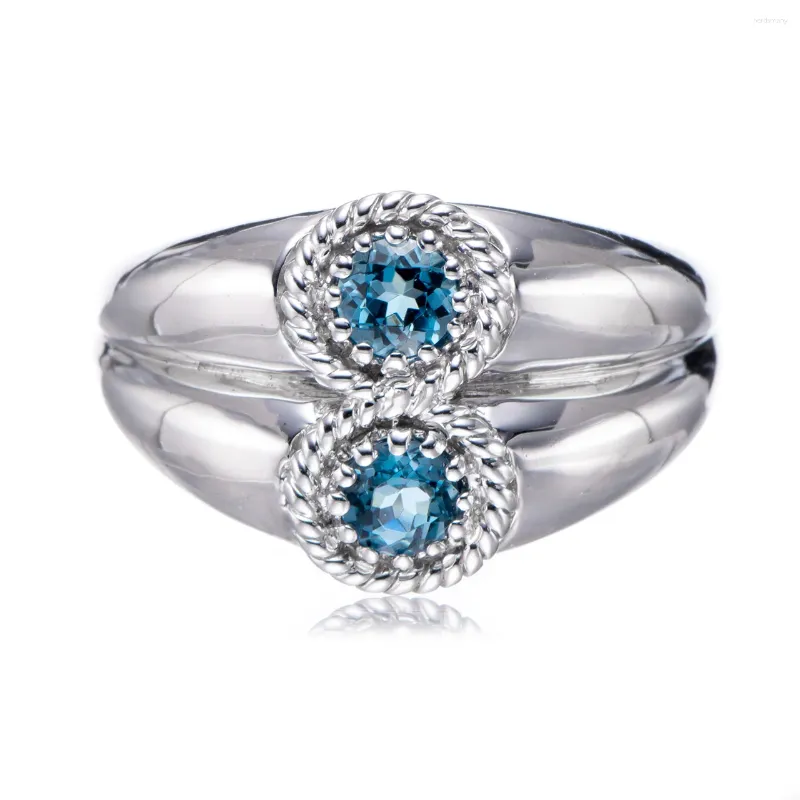 Anelli a grappolo Anello in argento sterling rodiato con topazio blu London