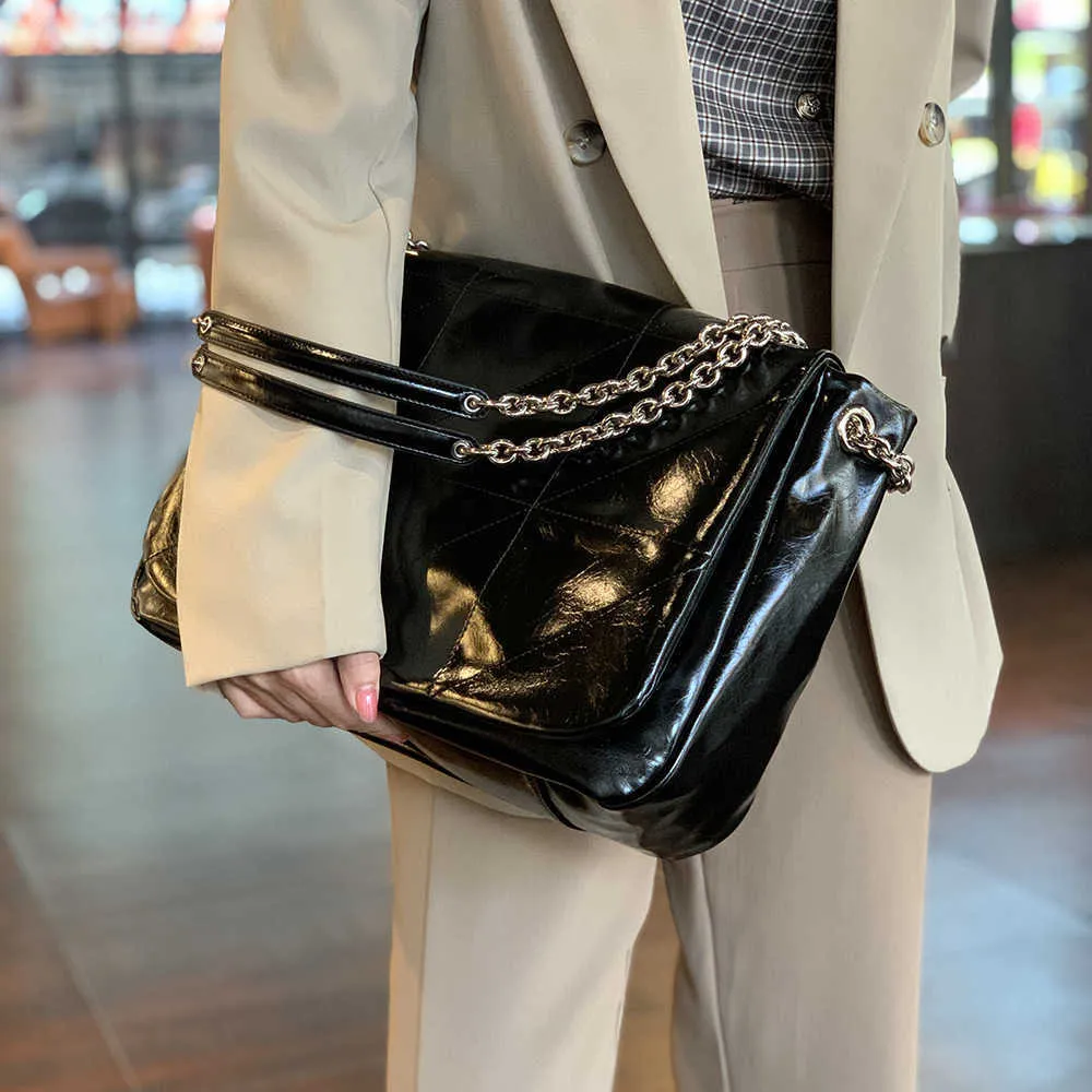 Abendtaschen: Die neue Lingge-Kettentasche bietet ein minimalistisches High-End-Gefühl mit Nischendesign. Es verfügt über eine Ein-Schulter-Handtasche für Damen mit großer Kapazität und Pendlerpost