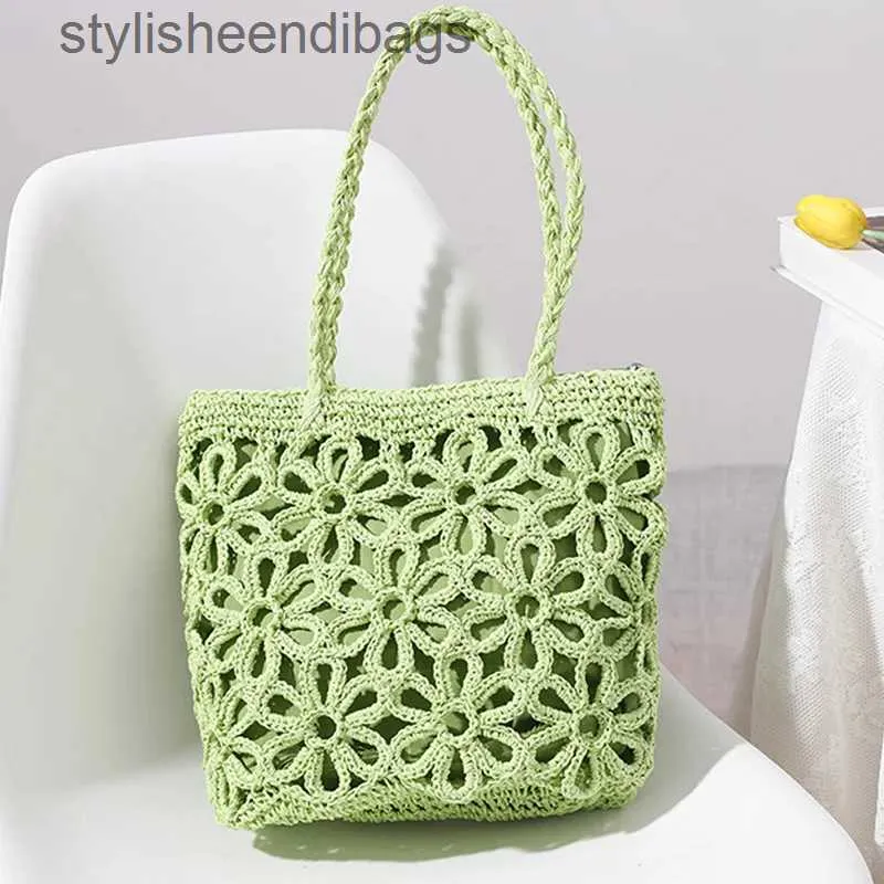 Bolsos de hombro Nuevo bolso str, bolso tejido con flores huecas, bolso de hombro para mujer, bolso portátil de ratán para vacaciones en la playa, bolsos elegantes