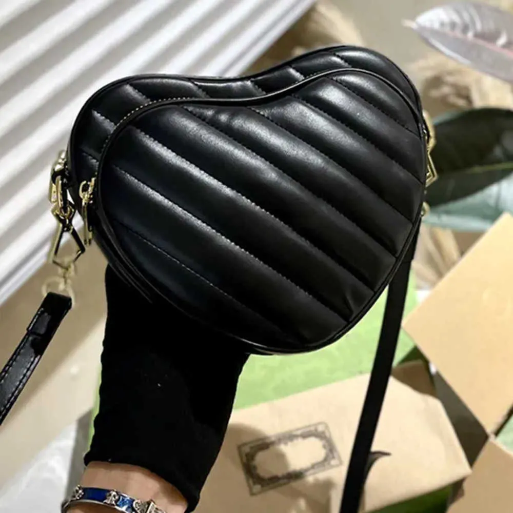 Kvinnor älskar väska canvas svarta axelväskor crossbody handväska vanlig äkta läder klassiskt brev tryck blixtlås med öppen designer handväska borttagbar rem 231115