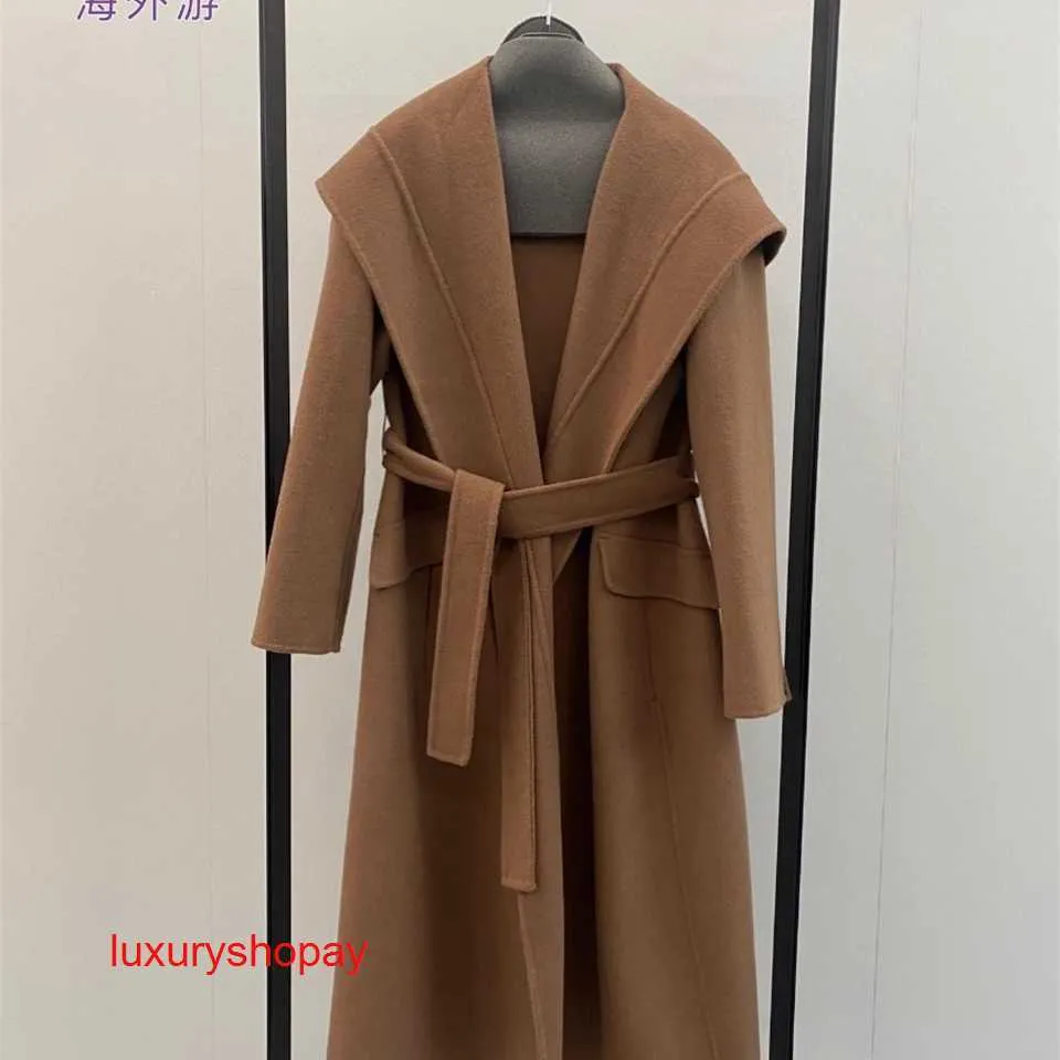 Maxmaras Women's Wrap Coat Camel Hair Coats 23FW NY SVAZIA Cashmere Hooded Collar med Loose Tie Up Long Sleeved Woolen Coat for Women Rjje