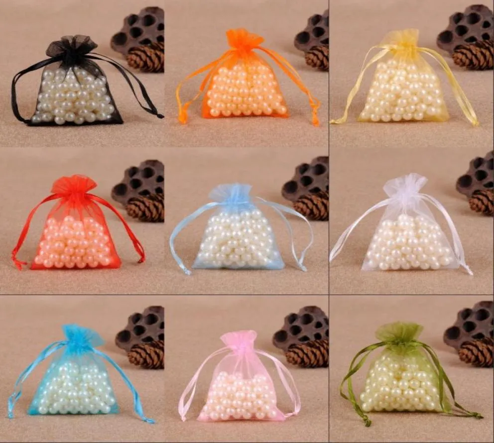 I più nuovi sacchetti per gioielli da 100 pezzi Sacchetti viola con sacchetto con coulisse Sacchetto regalo in organza Sacchetti per imballaggio 96 N25632010