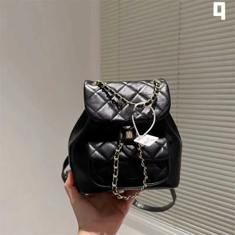 Designer backpack stil kvinnors backflip mini skolväska guld väska knapp läder mode kedja handväska diamantkontroll koppling