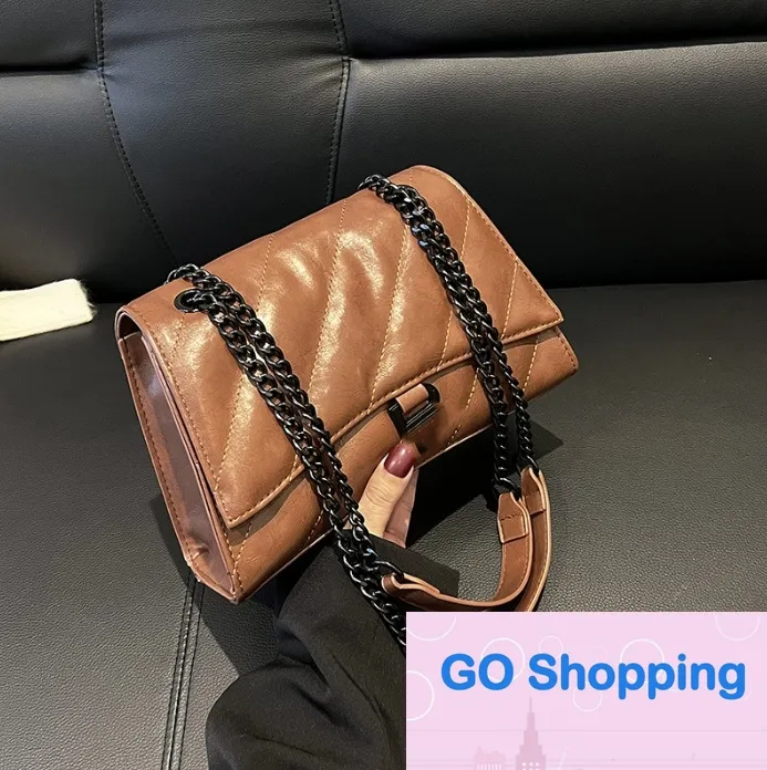 Bolso de mujer Otoño e Invierno nuevos bolsos populares de reloj de arena bolso de mensajero Popular de nicho de alto sentido bolsos de cadena para axilas