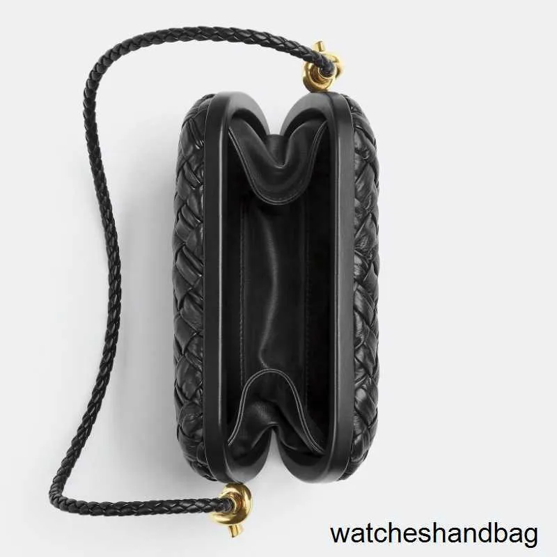 knot minaudiere on strap