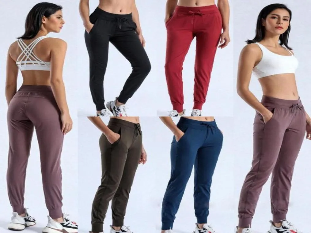 Tecido Nakedfeel Workout Sport Joggers Calças cortadas Mulheres Cintura Com Cordão Fitness Running Sweat Pant com dois bolsos laterais 7778220