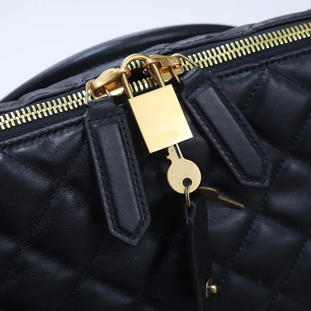 新しいホットセルファッションショッピングバッグ本革デザイナーブランド男女ユニセックススタイルの大きな旅行バッグ