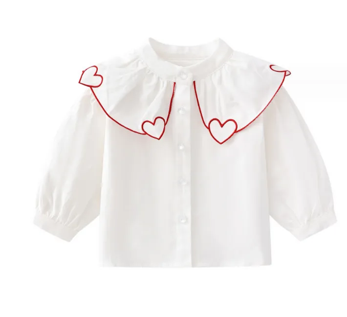 Les petites filles aiment la chemise de broderie de coeur en bas âge enfants falbala revers simple boutonnage à manches longues princesse hauts 2024 printemps enfants vêtements en coton Z6643