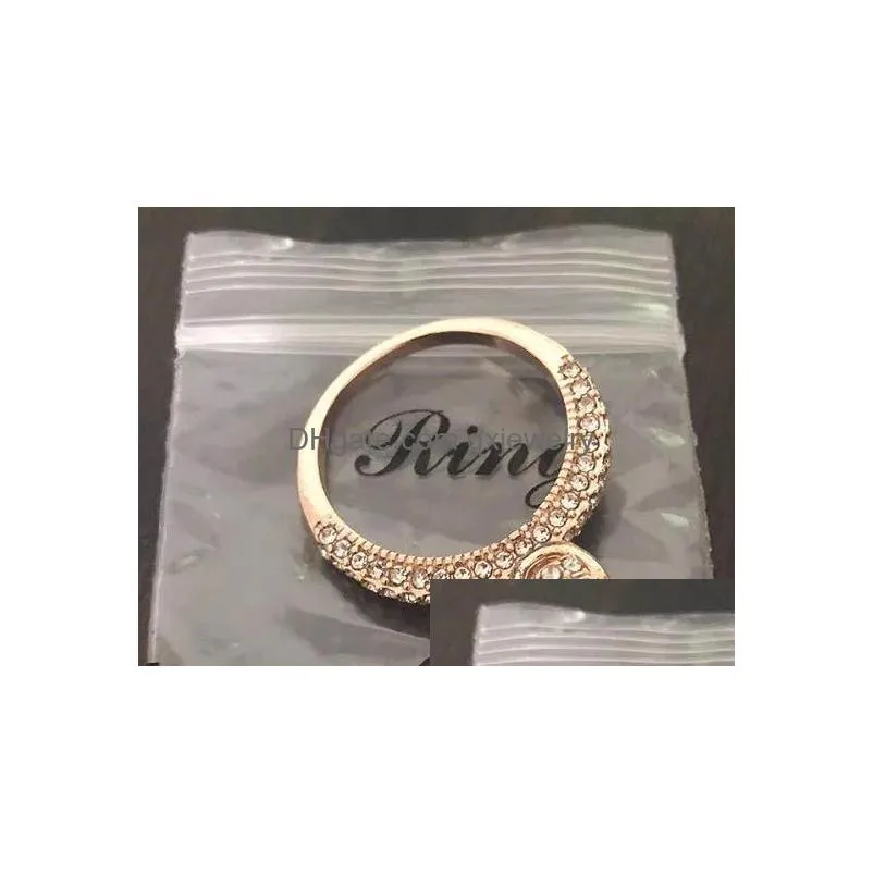Pierścienie zespołowe Pierścień damski Romantyczny cyrkon lśniący okrągły ślub ślub mody mody biżuterii pierścionki zaręczynowe do upuszczania dostawy dh5zw
