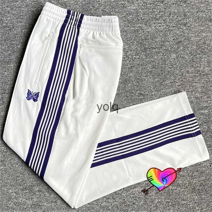 Pantalons pour hommes 2023 Bleu Tricoté Stripe Aiguilles Papillon Tra Pantalon Hommes Femmes Poly Smoo AWGE Aiguilles Pantalon Blanc Pantalon Étroityolq