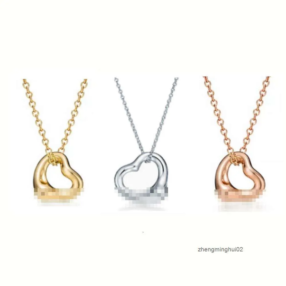 TiffanyanyFashionable och minimalist 925 Sterling Silver Hollow Heart Shaped Love Pendant Necklace With Peach Heart CollarBone Chain