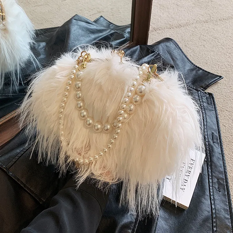 Fabriksuttag kvinnor axelväskor 3 färger mao mao chain väska söt lady pearl handväska elegant atmosfär mode ryggsäck söta tofs handväskor 13416#