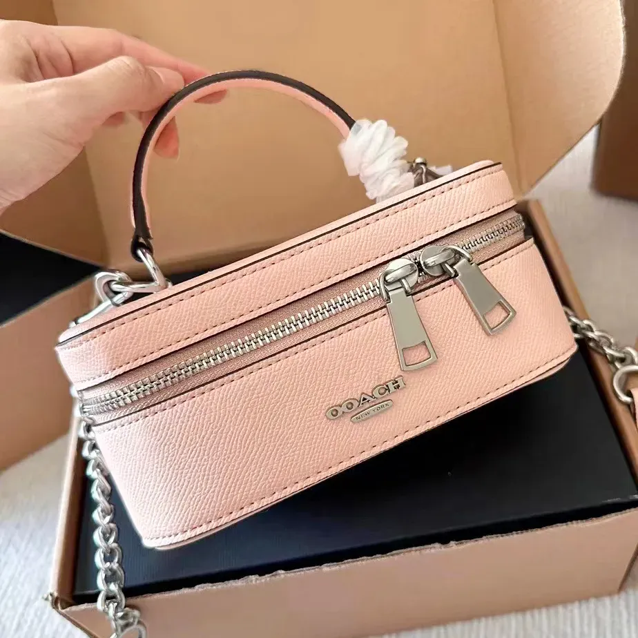 Uxury Designer para mujer Caja de maletero Bolsas de almuerzo Bolsas de maquillaje Bolsas de maquillaje de alta calidad Cuero genuino para hombre Viajes Embrague Totes Bolsa Lady Moda Trabajo Cámara vintage Bolsas de hombro cruzadas