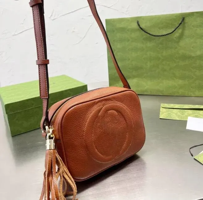 2024Classic Women Designers Luxurys väskor Läderhandväskor axelväska Tassel Disco Clutch Women Shopping Tote Female Purse Handbag Cross Body Handbag