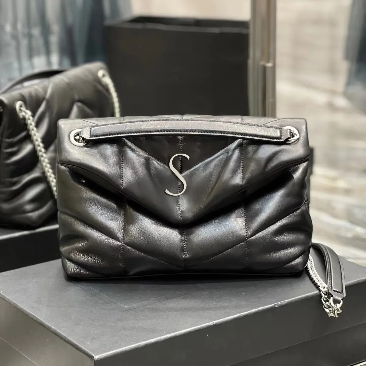 Lüks zincir puffer tasarımcıları çanta erkekler moda gerçek deri pochette çantaları zarf bayan tote debriyaj çantaları çapraz omuz el çantası