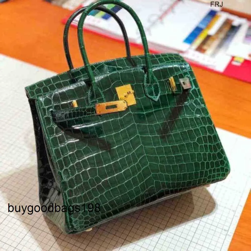 Sacs de créateurs Sacs à main pour femmes Sac en cuir Mode Tempérament haut de gamme Motif crocodile Platine Designers Syemj ont un logo