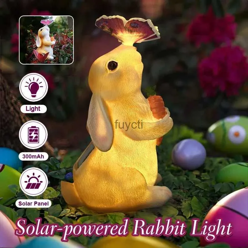 Autres fournitures de fête d'événement Lapin Statue Décor Solaire LED Lumières de Lapin avec Papillon Lumineux Résine Sculpture Pâques Extérieurs Jardin Pelouse Ornement Cadeaux YQ240116