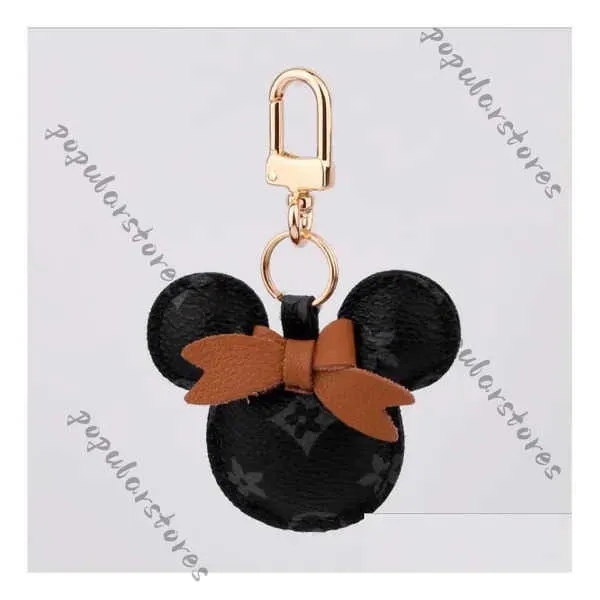 Designer Keychains Lanyards Llavero Mouse Design Car Keychain Favor Flower Bag Pendant Charm smycken Keyring Holder For Men Gift Fashion Pu Leather Passale GW5N