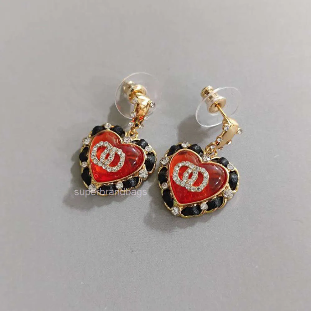 Bijoux de la chaîne de mode Nouvelle grenade en forme de coeur rouge Love Love Heart Boucles d'oreilles C