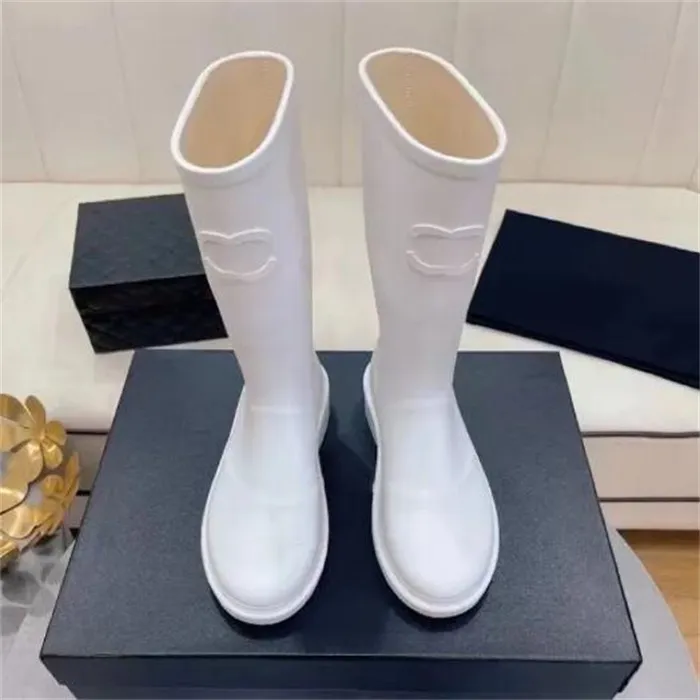 Stivali da pioggia da donna di design di lusso con punta quadrata tacco spesso suola spessa Stivali lunghi stivali moda uomo stivali di gomma da donna nuove scarpe da pioggia a tubo alto impermeabili e antiscivolo