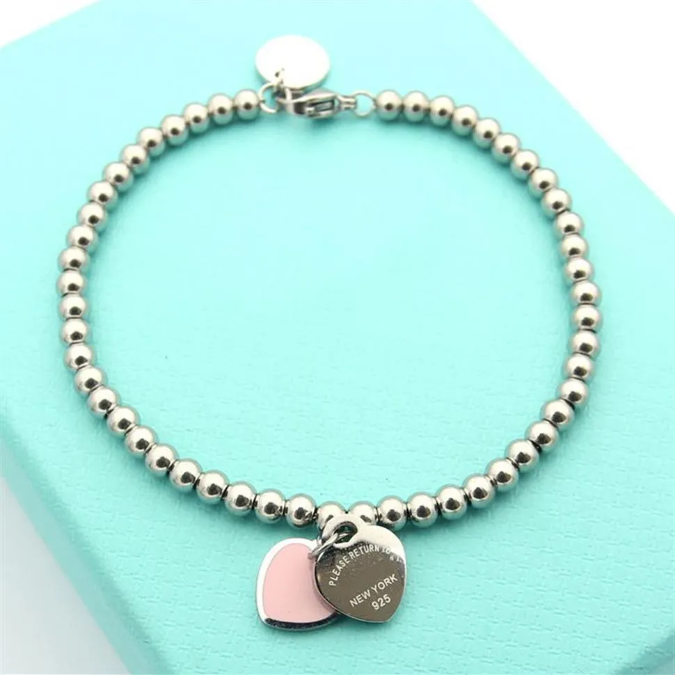 Braccialetti di design da donna color argento con ciondolo a doppio cuore in acciaio inossidabile di lusso con perline a forma di cuore282Q