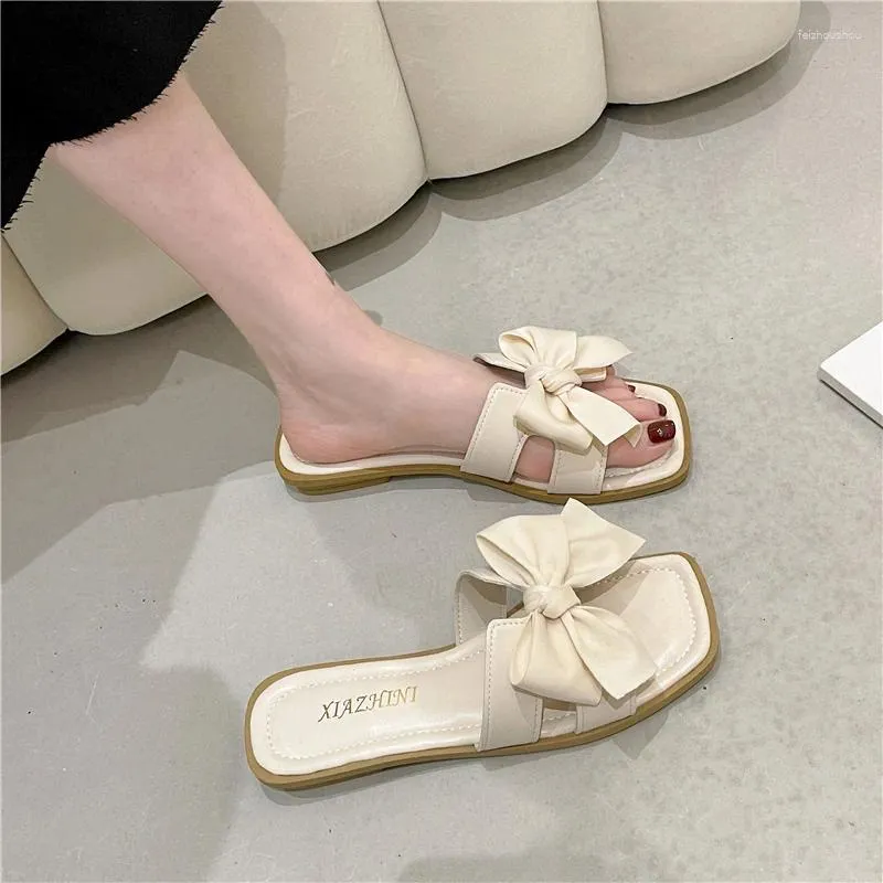 Slippers Halve pantoffels Dames Zomer Bovenkleding 2024 Netto Rode Sandalen En Platte Bodem Strik Eén Woord Drag Fairy Wind