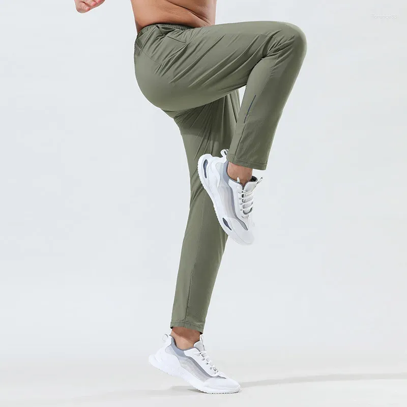 Calças masculinas mrmt 2024 marca sweatpants solto seção fina respirável gelo seda ao ar livre lazer yoga calças de secagem rápida