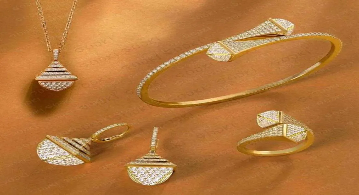 Godki الشهيرة العلامة التجارية 4pcs مجموعات المجوهرات Waterdrop للنساء حفل زفاف مكعب الزركون الزركون الراقية الحرف دبي المجوهرات مجموعة 2107204172482
