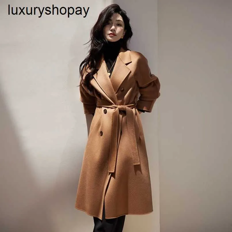 Designer Maxmaras Cashmere Coat Womens ullrockar High End Brand Antisäsong fördubblar ren kashmirrock för kvinnors medellängd stil elegant hepburn kamel c