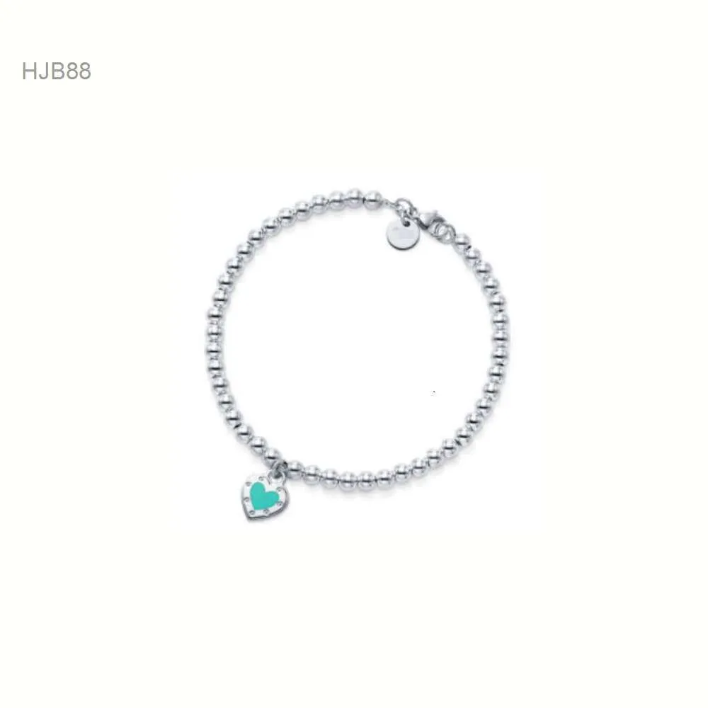 Hängsmycken lyxiga smyckesdesigner Tiffanyitys kedja Bangle Tiffanyitys Armband T 925 Sterling Silver Drop Lime Rivet Heart 4mm Round Bead Armband Tee Love Ena Kmom