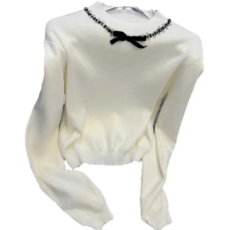Tasarımcı Kadın Sweaters Miu Ailesi 23 Erken Sonbahar Yeni Çağ Kız Stili Yuvarlak Boyunca Boncuklu Pullu Yay Kısa Uzun Kollu Kazak Yzdq