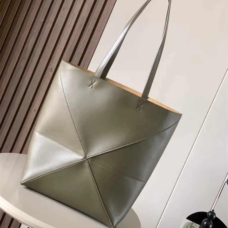 Designer kvinnors väska axel mode casual tote cowhide mode färg geometri väska vikar väska stor kapacitet shopping väska56