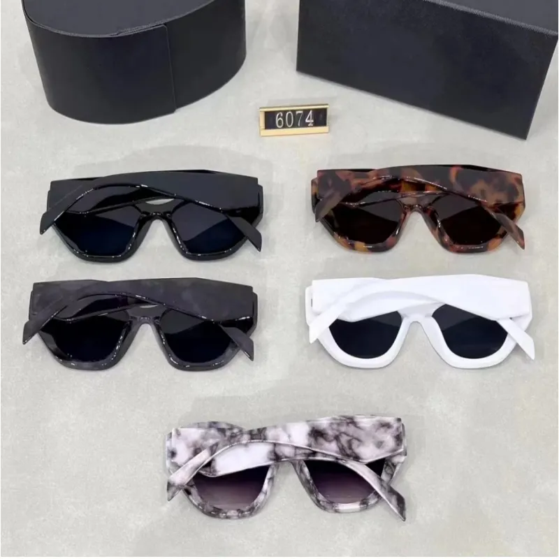 Luxe designer zonnebril voor dames Zomer Elegante stijl UV-beschermde schildlens Cat Eye-zonnebril Modieuze stijl Full-frame modebril met doos