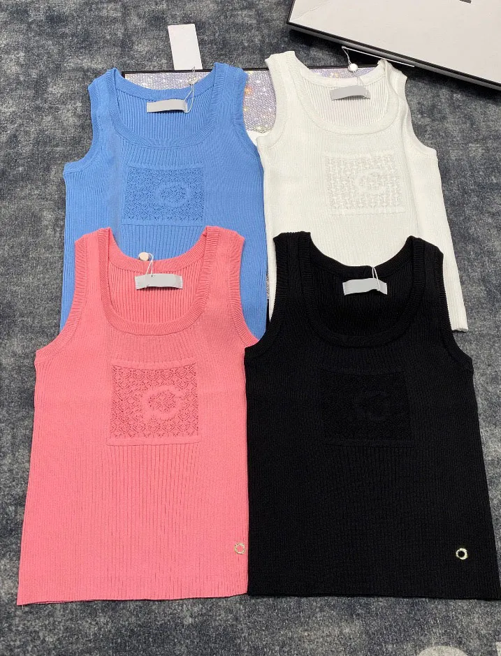 Diseñador de moda 2024 verano 4 colores Casual ahueca hacia fuera las camisetas de las mujeres cuello redondo sin mangas Color sólido Slim Tops