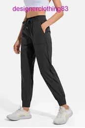 2023 lululemen womens LL Women Jogging Yoga Ninth Pants Pocket Fitness Leggings Soft High Waist Hip Lift Elastic Casual Drawstring Legs Sweatpants