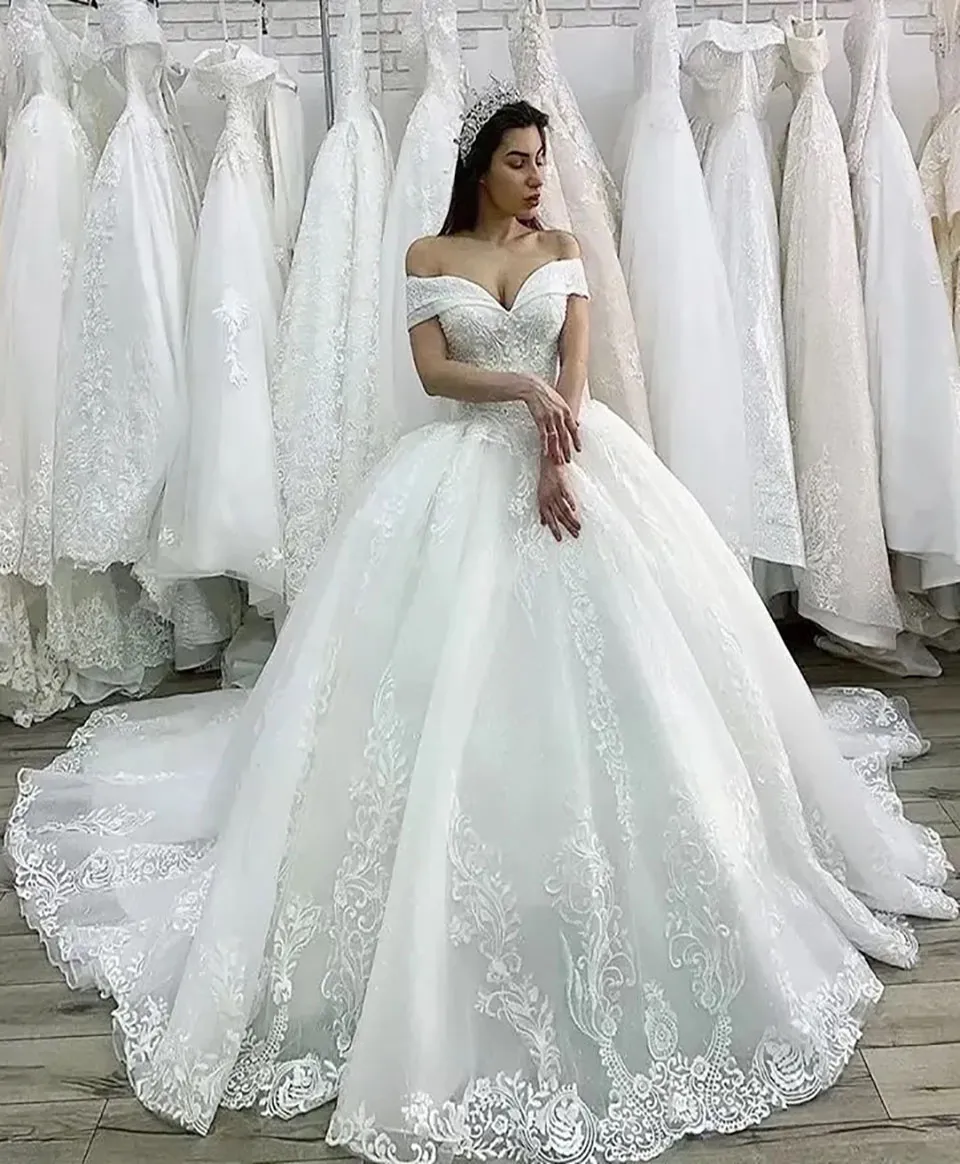 Off shoulder ivory wedding dress hotsell