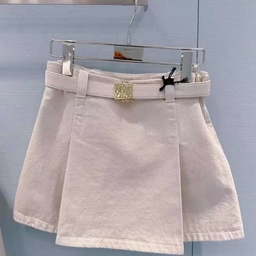 Mujeres de verano pantalones de moda de diseño corta joya de metal joya de cintura alta falda de mezclilla