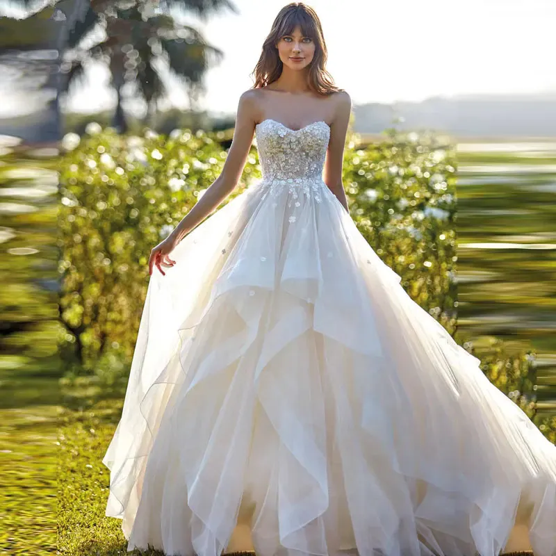 Vit älskling a-line tyll bröllopsklänning 2024 för kvinnor nya stropplösa spetsapplikationer brud rygglösa klänningar vestido de noiva yd