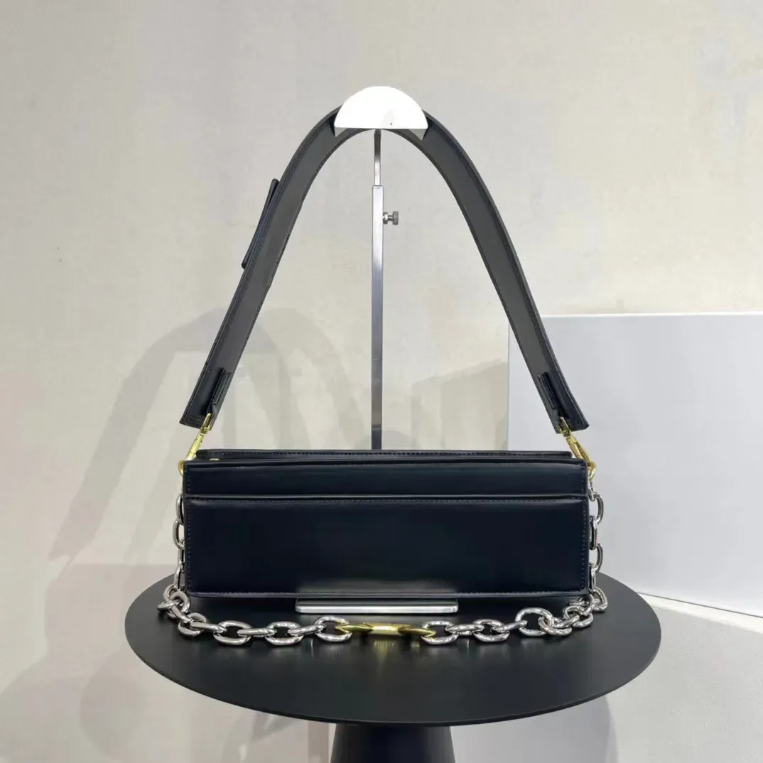 Fashion äkta läder tote axelväska baguett lyxdesigner kvinnors män messenger metall purses handväska crossbody afton clutch väskor