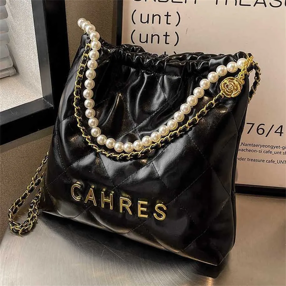 Sac pour femmes High and Lingge Pearl, nouvelle version, seau à une épaule avec bandoulière design de niche 7889