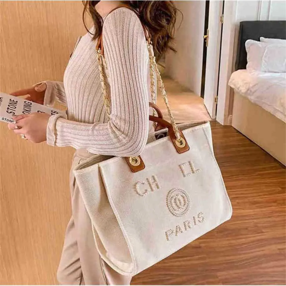 Luxury Classic Fashion Beach Bags Tote Etikett Pearl Evening Bag Portable Large Capacity Female Canvas Handväska Kvinnor Handväskor Damer Ryggsäck 80% rabatt på uttag Slae