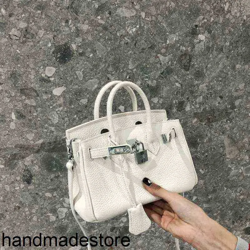 Platinum Bag Sac à main Designer Première couche de peau de vache Printemps et été Petit messager 2024 Cuir Polyvalent Une épaule Portable Mini Femme