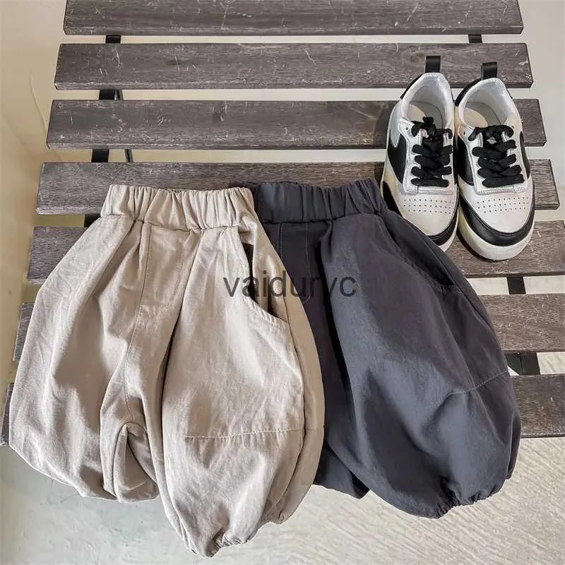 شورتات 2023 الصيف Ldren New Loose Disual Disual Solid Shorts Thin Cotton Boys Girls Shorts Fashion Ldren Clothing H240508